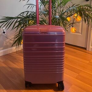 Beis carry on roller from the Wicked collection glossy pink color used once